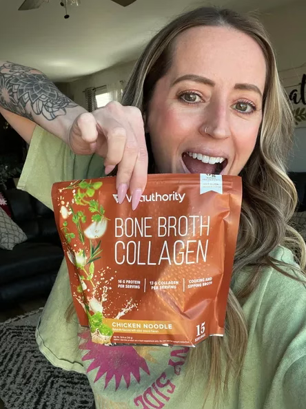 Woman holding a package of Vitauthority Bone Broth Collagen 
